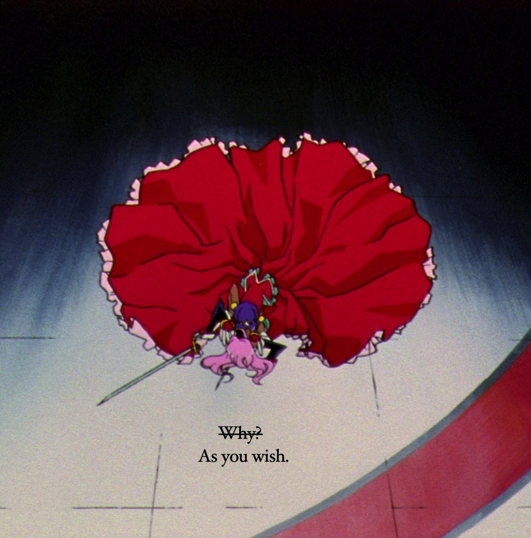 Anthy has stabbed Utena. Caption: Utena’s 'why?' is crossed out and replaced with 'as you wish'.